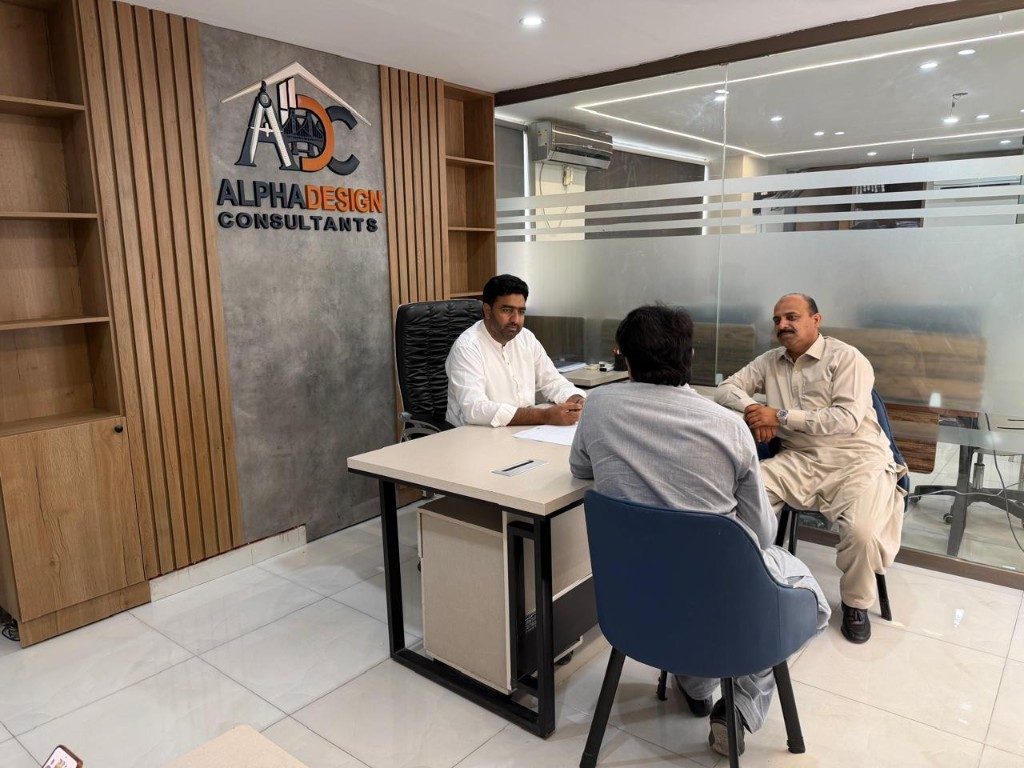 Client meeting in the Managing Director's office at Alpha Design Consultants